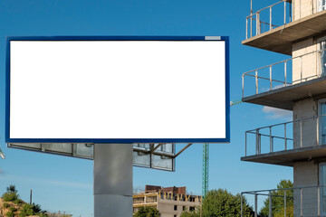 Fototapeta premium Blank white billboard for advertisement on the construction site