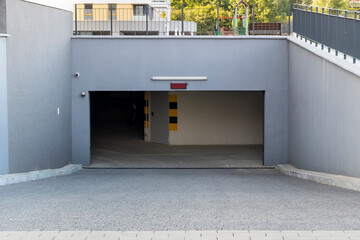 Open garage gate in the modern residential building