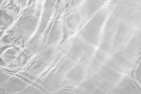 Water texture with sun reflections on the water overlay effect for photo or mockup. Organic light gray drop shadow caustic effect with wave refraction of light. Banner with copy space. © esvetleishaya