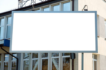 Advertising billboard mock-up in front of the office building