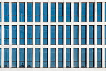 Facade of modern office building with a lot of windows