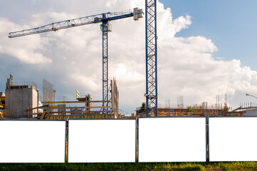 Blank white banner for advertisement on the fence of construciton site