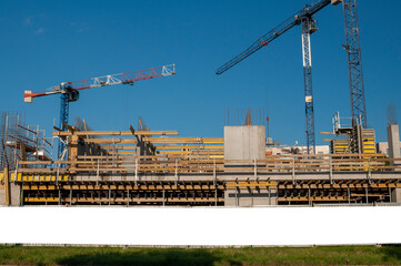 Blank white banner for advertisement on the fence of construciton site