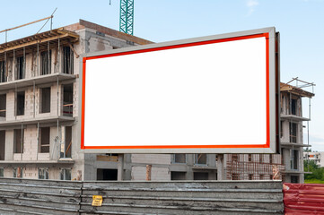 Blank white advertising billboard on the construction site