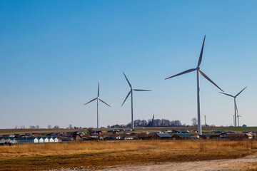 Wind turbines in a village. Renewable energy
