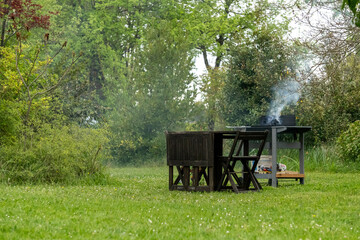 Barbecue in the middle of the garden, in early spring