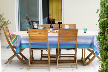 Aperitif on the terrace table, in the garden