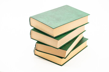  Books stack with green covers on a white background.Reading of books. Knowledge concept.Reading and education. Literature and reading concept. 