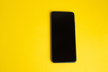 Naklejka premium New cell phone over colorful background
