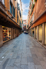 Fototapeta na wymiar The narrow streets of the old city of Venice, Italy.