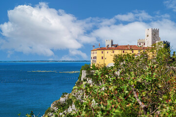 Fototapeta na wymiar Gothic Duino castle on a cliff over the Gulf of Trieste (Adriatic sea), Italy.