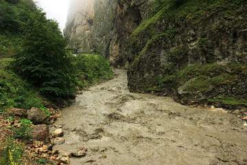 Muddy river in the canyon.