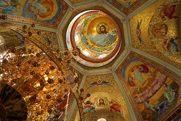 Fototapeta na wymiar religious buildings. Pochayiv, Ukraine - interior decoration of the cathedral in the Pochaev Lavra. Interior of Holy Dormition Pochayiv Lavra, Ukraine. May 2021