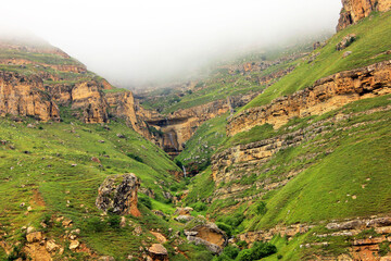Obraz premium Beautiful waterfall in the red mountains. Gryz village. Guba region. Azerbaijan.