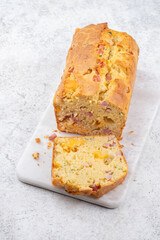 Savory ham and cheese loaf on cutting board