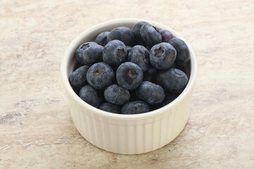 Sweet ripe blueberry heap in the bowl