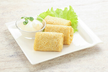 Stuffed pancakes with meat and cream