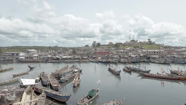 Aerial shot of a settlement along the coast (coastal line) in Africa, Ghana, Elmina