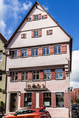 Dinkelsbühl, Germany. Facade of an old building with sculptures