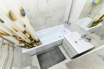 Russia, Moscow- May 21, 2020: interior apartment room bathroom, sink, decorative elements, toilet