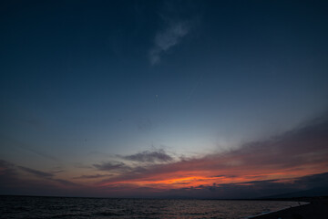 Fototapeta premium 千本松原から観る夕日に染まる山