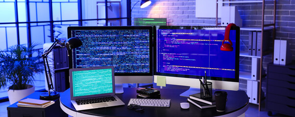 Interior of programmer's office at night