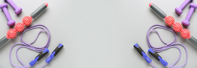 Sports equipment on grey background with space for text