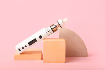 Modern vape mod on pink background