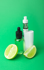 Modern vape mod, oil and lime on green background