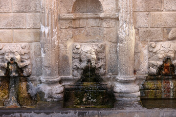 Rimondi Fountain in Old Town of Rethymnon in hot summer day. Crete, Greece.