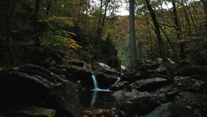 Scenic rippling stream in the fall, Trees with beautiful autumn colors. Cascade de la Chaudiere...