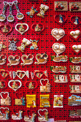 Showcase with funny magnets with pictures of Romeo and Juliet, Verona, Italy