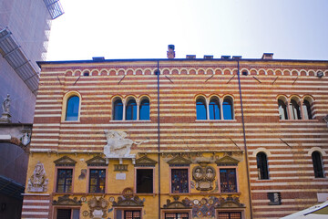 Fragment of Palazzo della Ragione (Palace of Justice) in Verona, Italy - obrazy, fototapety, plakaty