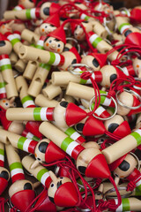 Wood traditional souvenir Pinocchio puppets from Italy