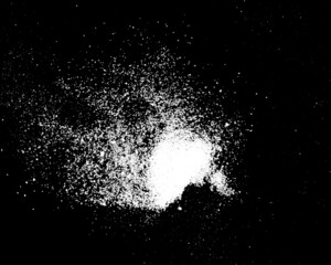 White powder explosion isolated on Dark background. White dust particles splash. Powder Explosion...