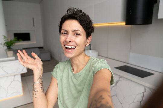 Happy Woman Taking Selfie At Home