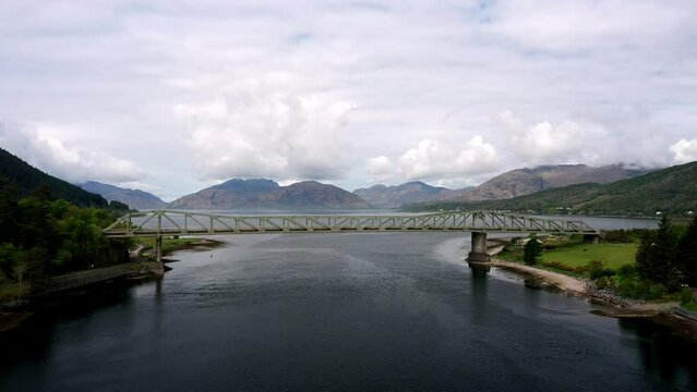 Ballachulish Bridge at Loch Linnhe near Fort William on a calm Spring morning calm sees reflections and clouds