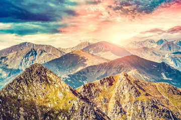 Naklejka na ściany i meble Mountains landcape at sunset. Tatra mountains
