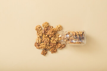 Jar of peeled halves of walnuts top view