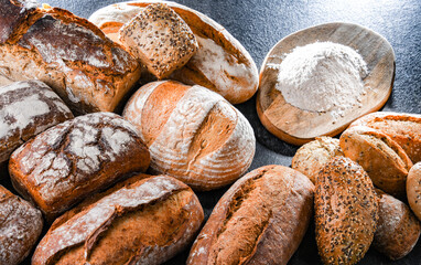 Assorted bakery products including loafs of bread and rolls
