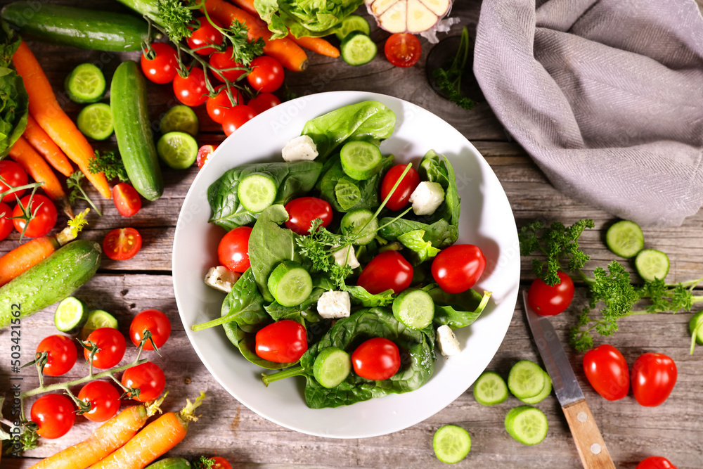 Wall mural mixed salad with spinach,  tomato,  cucumber