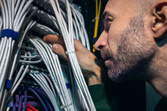 IT technician working in server room