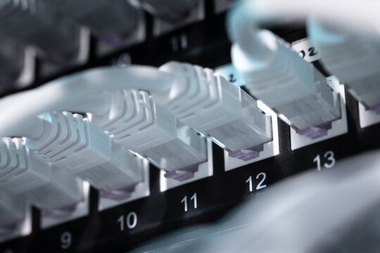 Bunch of cables in server room - Powered by Adobe