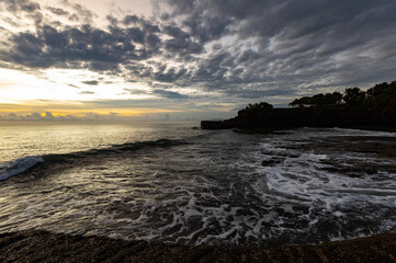 Breathtaking sunset in Bali near Tanah Lot temple, Indonesia
