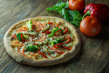 Vegetables Pizza ingridients on Wooden background 