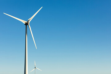 Wind turbine against sky