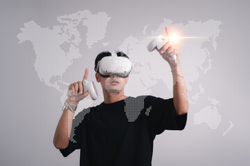 Man use vr glasses and looks at world map metaverse technology, studio shot.Virtual gadgets for entertainment, work, free time and study. game cyber Virtual reality technology concept.