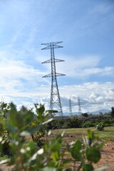 Obraz premium electric, transmission, grid, hill, mountain, power, station, tower, background, cable, caution, construction, cost, distribution, dusk, electrical, electricity, energy, engineer, engineering, enviro