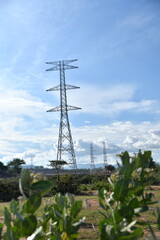 Obraz premium electric, transmission, grid, hill, mountain, power, station, tower, background, cable, caution, construction, cost, distribution, dusk, electrical, electricity, energy, engineer, engineering, enviro
