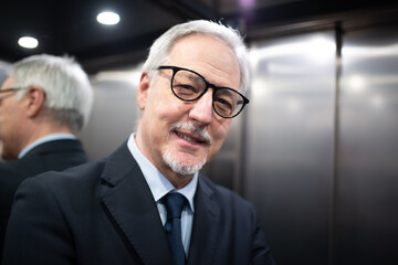 Businessman inside an elevator